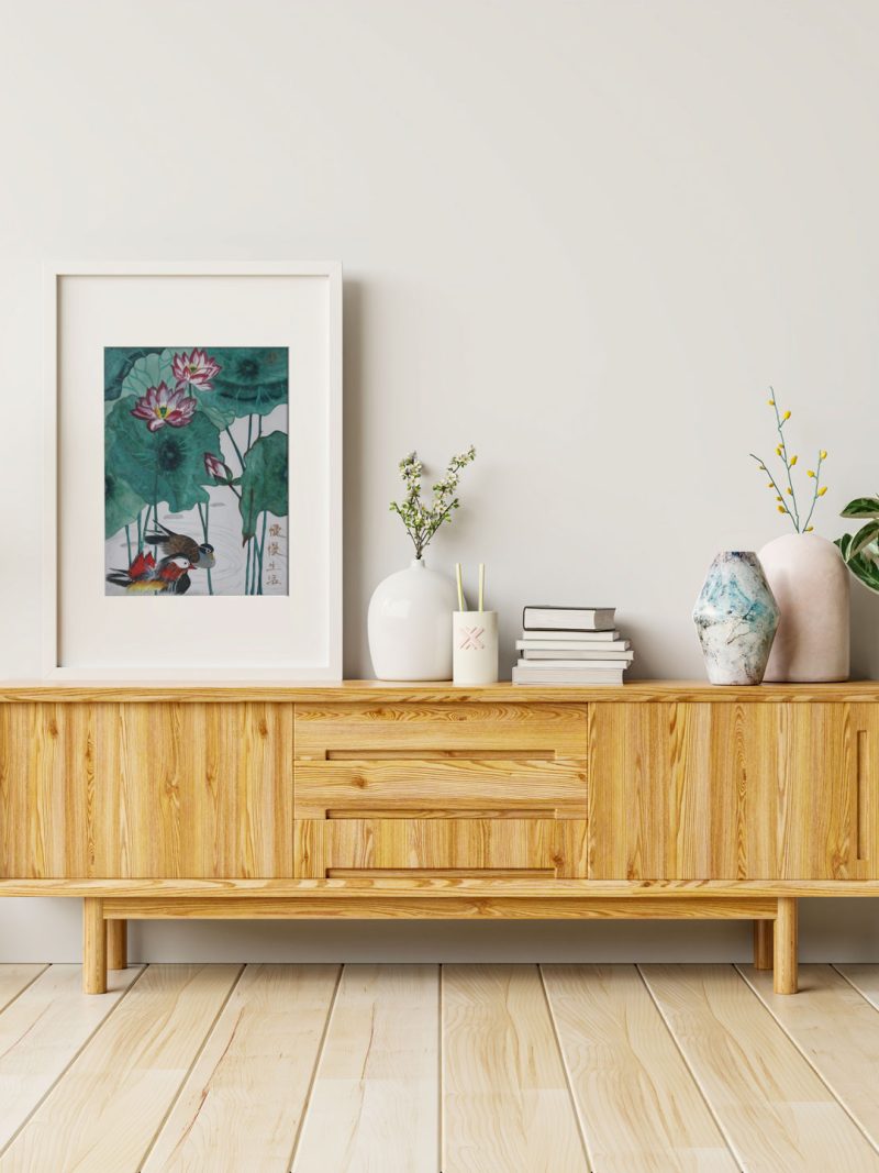 Two mandarin ducks playing in water